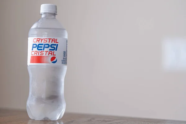 August 23 2022 - Calgary Alberta Canada - Cold Bottle of crystal Pepsi e
