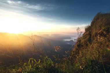 Panoramic scenery of mountains at sunset