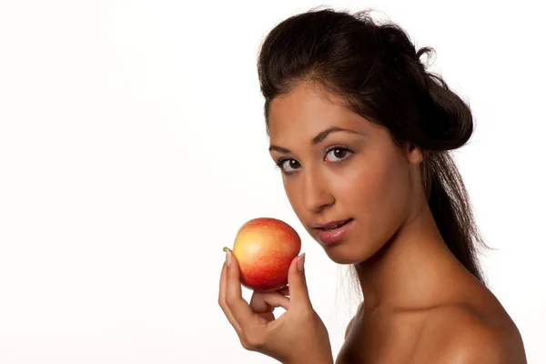 Pretty smiling woman with red peaches — Stock Photo, Image