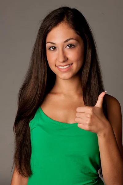 Attractive young woman showing thumb up — Stock Photo, Image