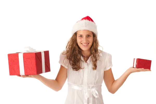 Vacker flicka klädd som santa med jul presenterar — Stockfoto