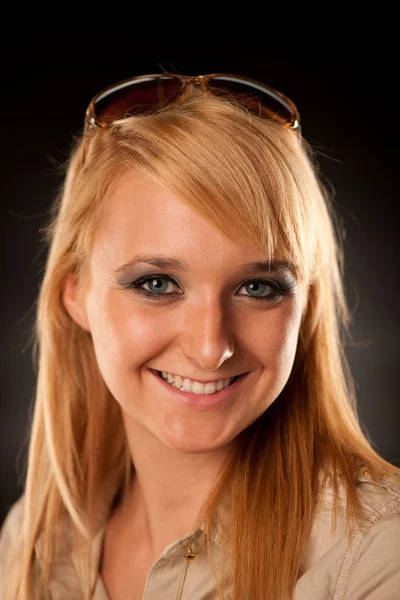 Portrait of attractive young blonde woman in shirt — Stock Photo, Image