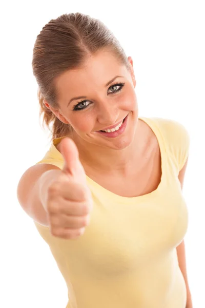 Beautiful young woman with blue eyes showing thumb up — Stock Photo, Image