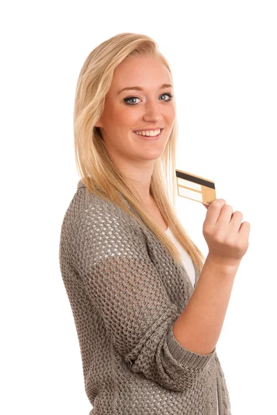 Mujer joven con crédito dorado — Foto de Stock