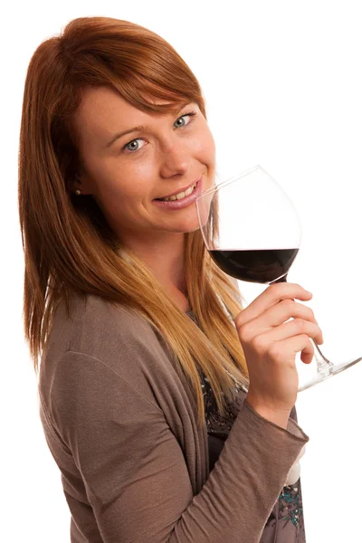 Attraktive Brünette mit einem Glas Wein isoliert — Stockfoto