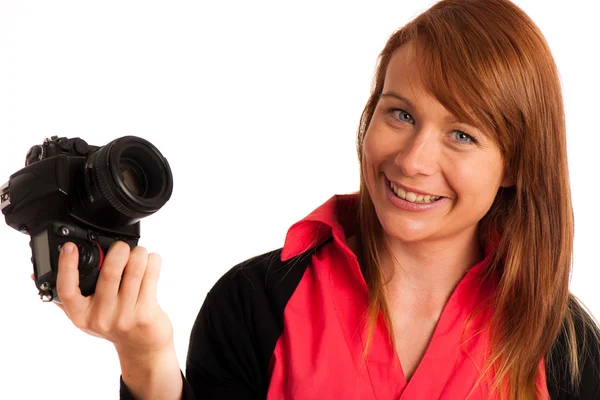 Jonge vrouw fotograaf met camera in haar hand — Stockfoto