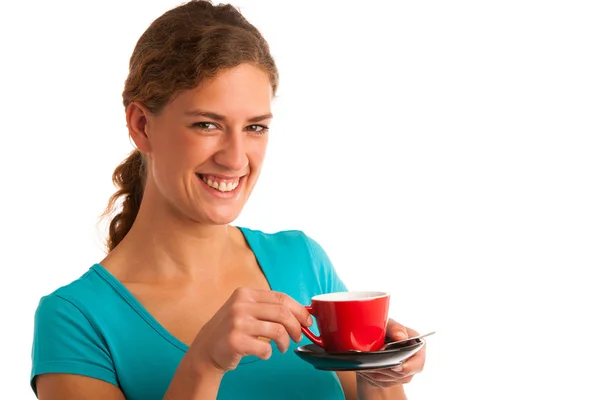 Girl in blue t-shirt drinking coffee — Stock Photo, Image