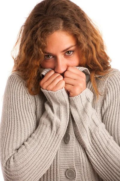 Woman blowing in her hands when feeling cold — Stock Photo, Image