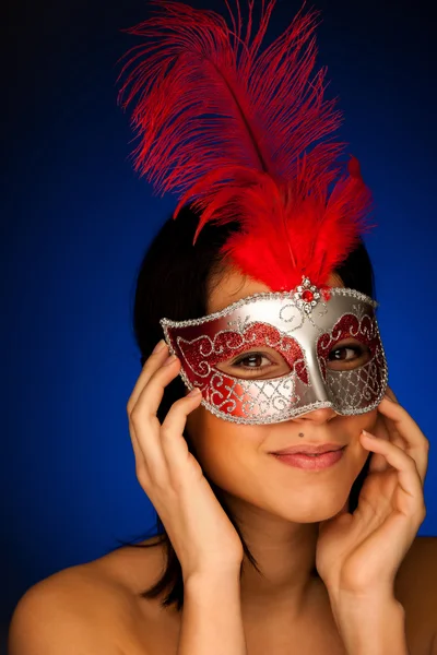 Beautiful young woman with venice carnival mask studio portrait — Stock Photo, Image
