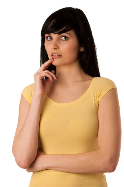 Pensive beautiful young woman looking into copyspace — Stock Photo, Image