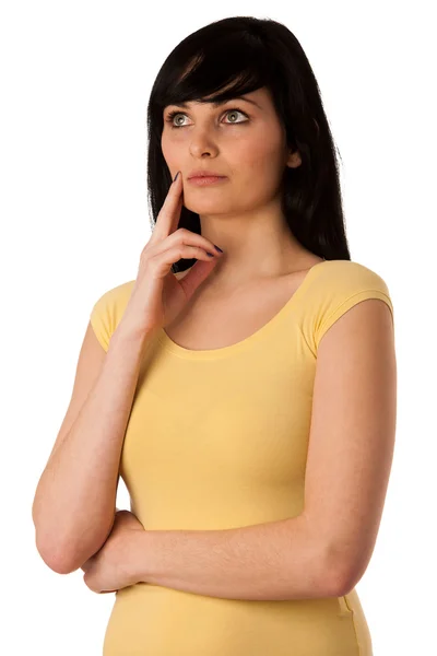 Pensive beautiful young woman looking into copyspace — Stock Photo, Image
