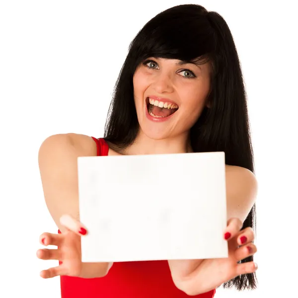 Excited beautiful young woman showing a blank paper isolated — Stock Photo, Image