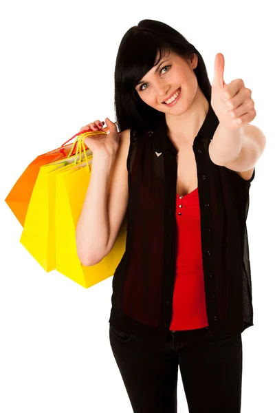 Piękna młoda kobieta z torby na zakupy na białym tle — Zdjęcie stockowe