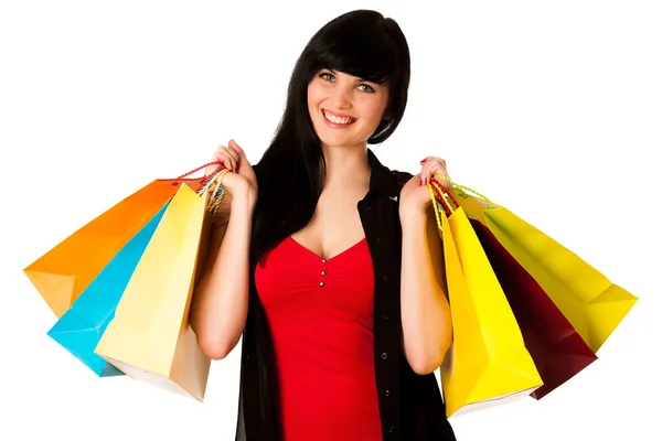 Belle jeune femme avec des sacs à provisions isolés — Photo