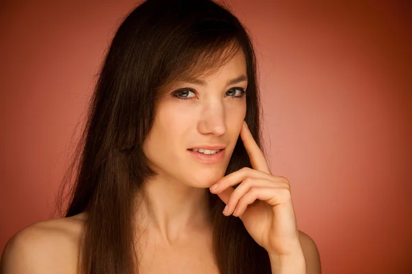 Beauty portrait of an attractive young brunette woman — Stock Photo, Image