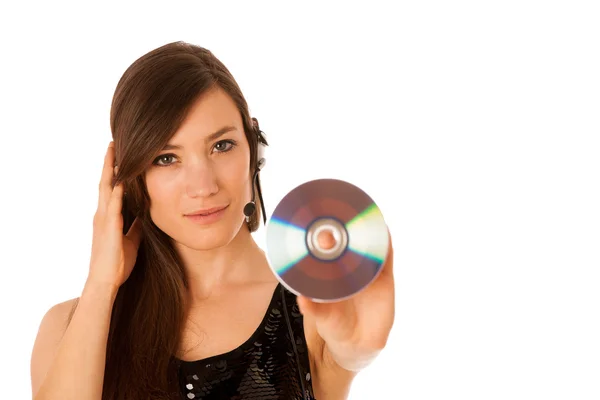 Jonge mooie vrouw dj met cd in haar hand — Stockfoto