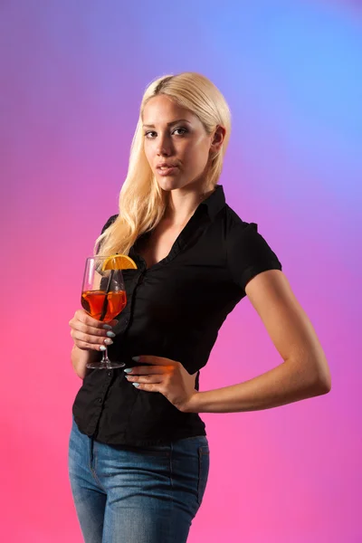 Beautiful young woman drinking aperol spritz — Stock Photo, Image