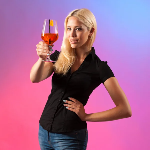 Beautiful young woman drinking aperol spritz — Stock Photo, Image