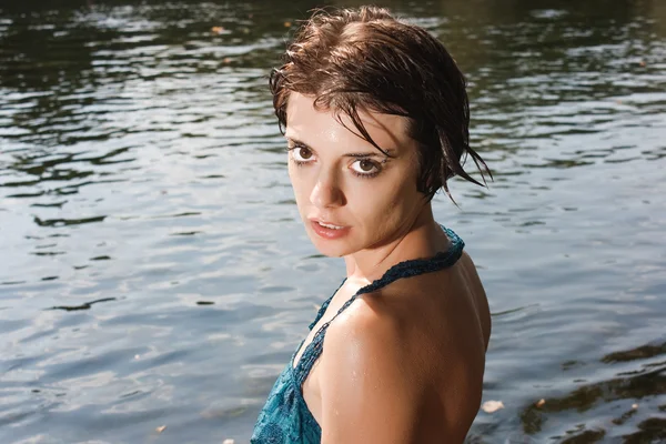 Beautiful young woman in the river — Stock Photo, Image
