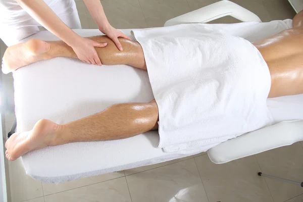 Hand Massaging Leg In Spa — Stock Photo, Image