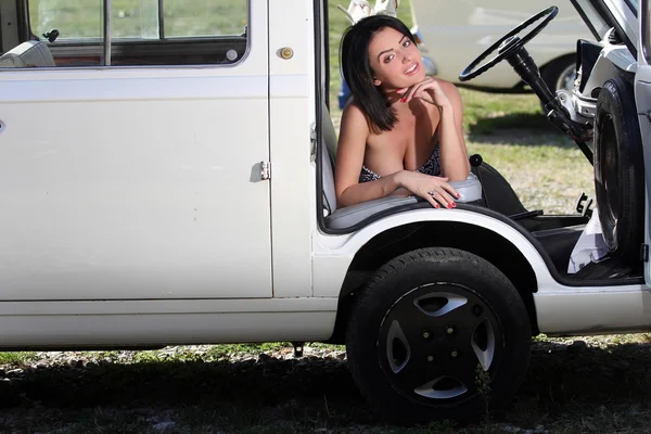 Sensual woman sitting retro car — Stock Photo, Image