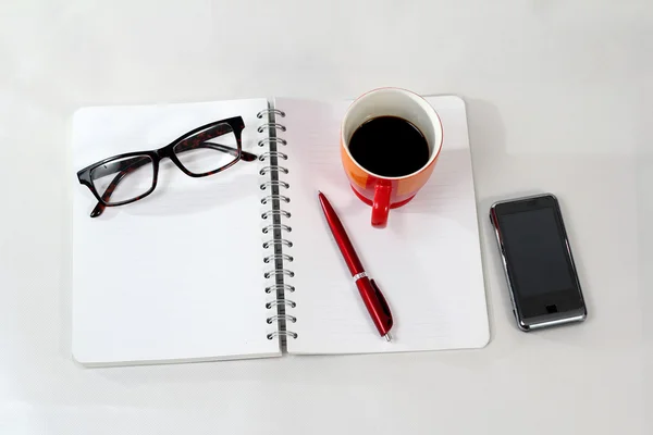 Notebook okulary kawa filiżanki — Zdjęcie stockowe