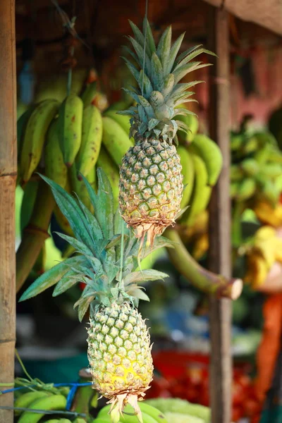 Fresh pineapples seen on a weekly fruit market — Stock Photo, Image