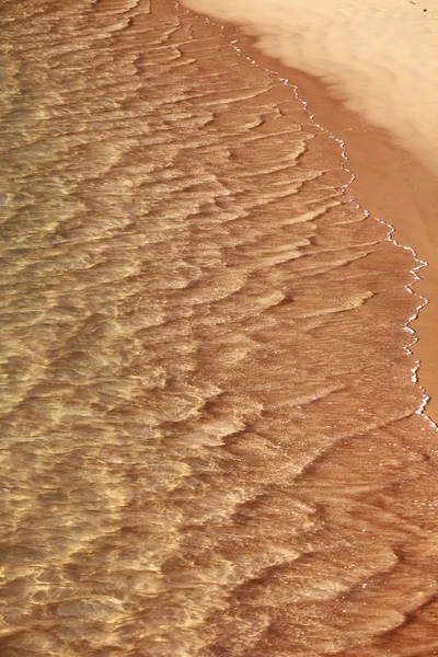 Sandstrand och våg — Stockfoto