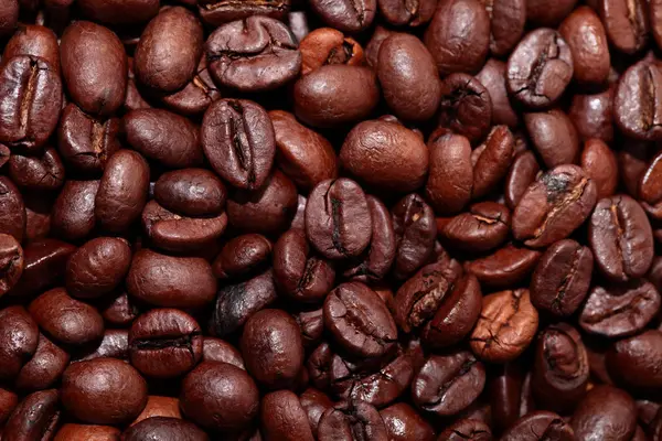 Primer plano de los granos de café fondo — Foto de Stock