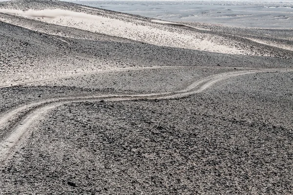 Zandduinen bij zonsondergang in de sahara in Marokko — Stockfoto