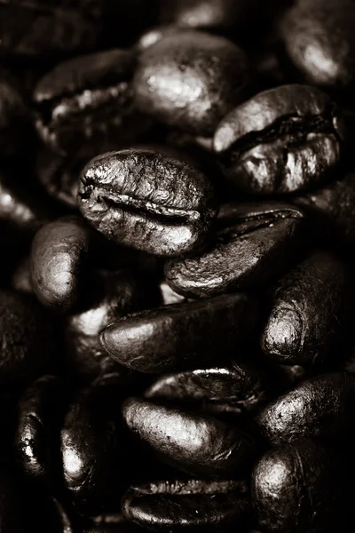 Granos de café sobre fondo de madera grunge —  Fotos de Stock