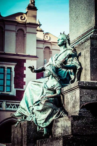 Krakow - fragments of the monument of Adam Mickiewicz. — Stock Photo, Image