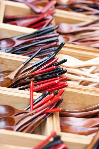 Wooden spoon small teaspoons new unused made of brown hard wood for sale on a street market in Thailand — Stock Photo, Image