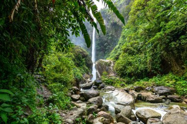 El Roco Machay waterfall in Banos Santa Agua, Ecuador. South America. clipart