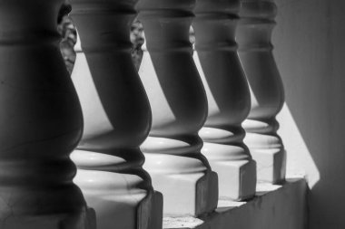 Light and shadow of balustrade. Black and white photography.