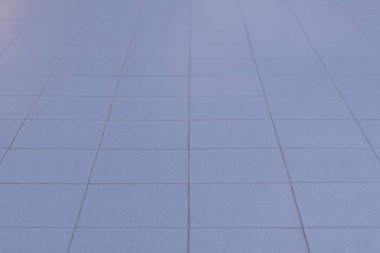 Tiles pattern perspective background. Symmetrical with square grid texture.