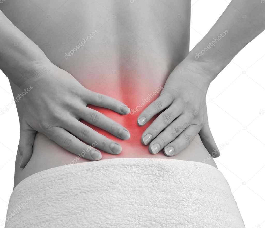 Pain in woman back. Female holding hands on spot pain back isola