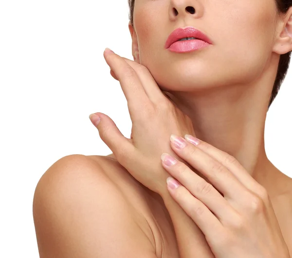 Beautiful female hand with clean skin near face isolated on whit — Stock Photo, Image
