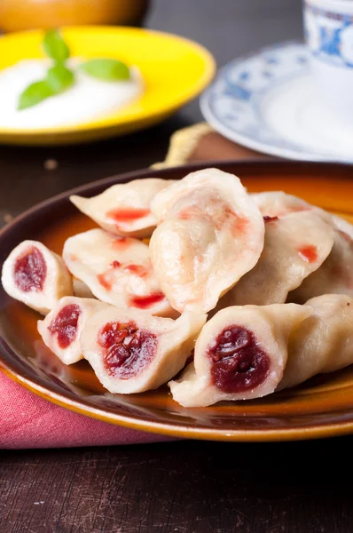 Dumplings with cherries — Stock Photo, Image