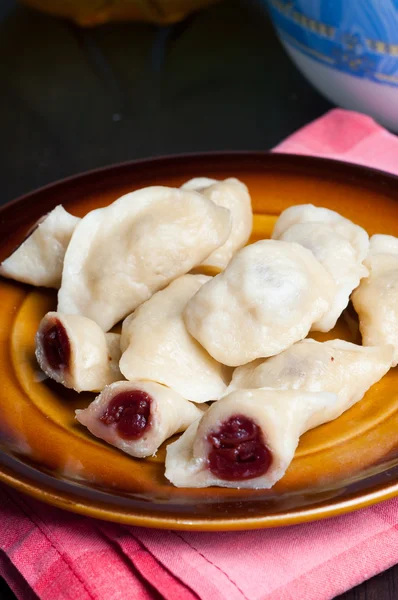 Dumplings with cherries — Stock Photo, Image