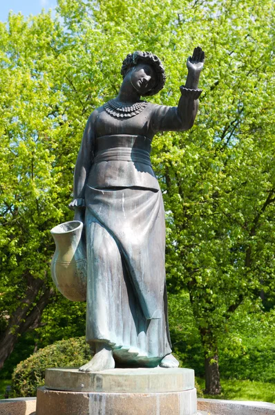 Woman with jug — Stock Photo, Image