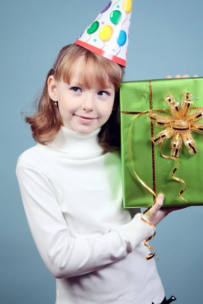 Beautiful girl with a gift. — Stock Photo, Image