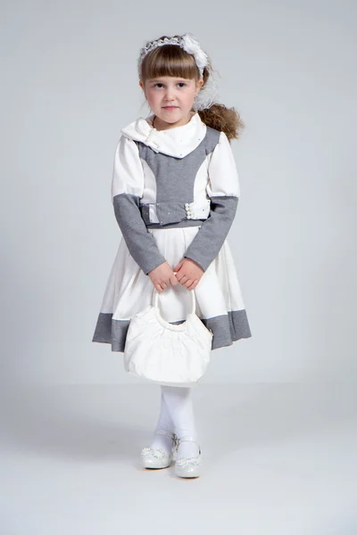 Little girl in the studio. — Stock Photo, Image