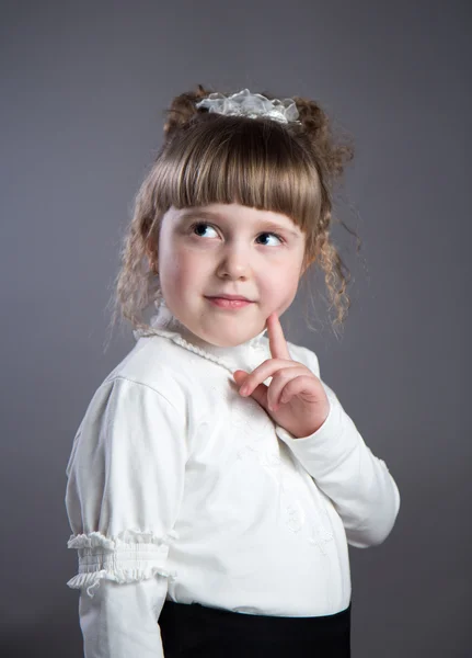 Little girl in the studio. — Stock Photo, Image