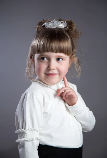 Little girl in the studio. — Stock Photo, Image