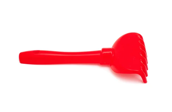 Red childish rake over white — Stock Photo, Image