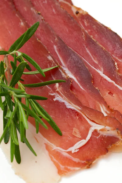 Cured ham isolated on white background — Stock Photo, Image