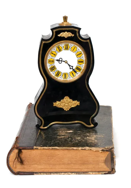 Old clock and book — Stock Photo, Image