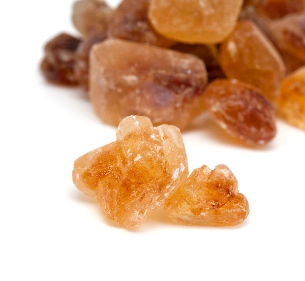 Brown caramelized sugar on white background — Stock Photo, Image