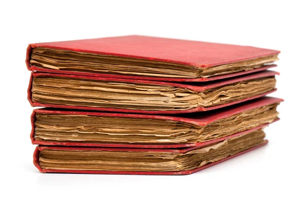 Stack av gamla böcker med röda skal — Stockfoto